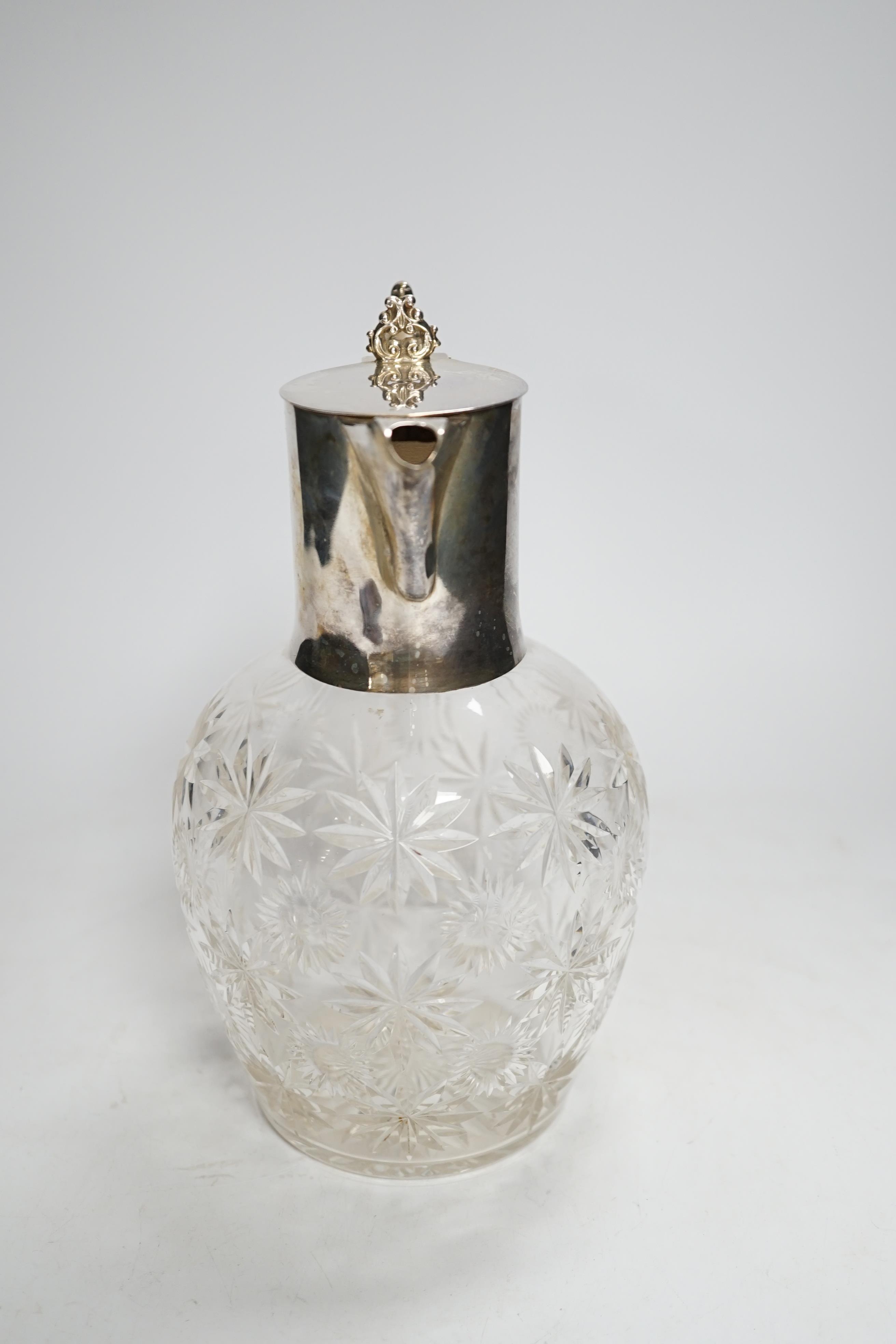 An Edwardian silver mounted cut glass claret jug, William Hutton & Sons, London, 1903, 21.8cm.